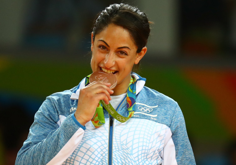 ירדן ג'רבי עם מדלית הארד. צילום: רויטרס