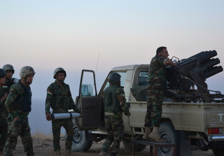 לוחמים כורדים נערכים  למתקפה על מוסול. צילום: רויטרס