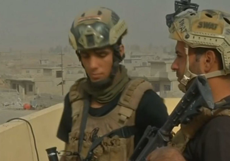 כוחות עיראקיים בתוך מוסול, אתמול. צילום: רויטרס