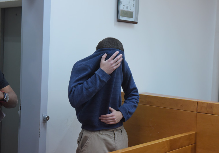 החשוד בהודעות שווא על הטמנת פצצות במוסדות חינוך בארה&quot;ב. צילום: אבשלום ששוני