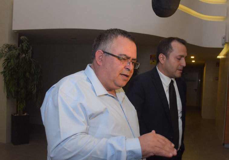 דוד ביטן לאחר חקירתו. צילום:אבשלום ששוני