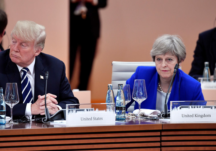 גינו במשותף את רוסיה. תרזה מיי ודונלד טראמפ, צילום: רויטרס