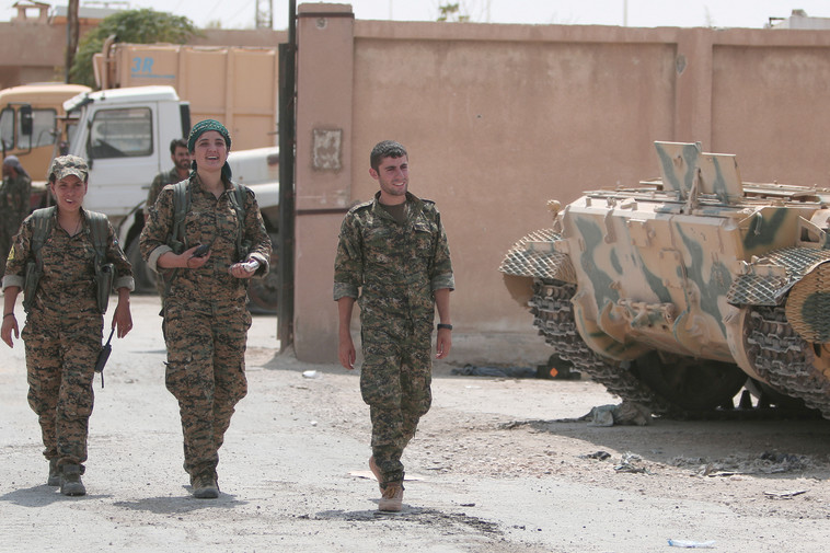 לוחמי המיליציה הכורדית בצפון סוריה. צילום: רויטרס