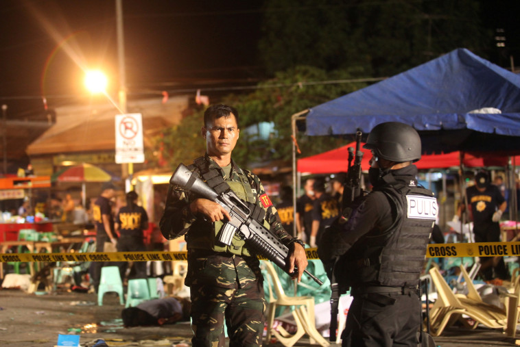 כוחות המשטרה בזירה, הלילה. צילום: רויטרס