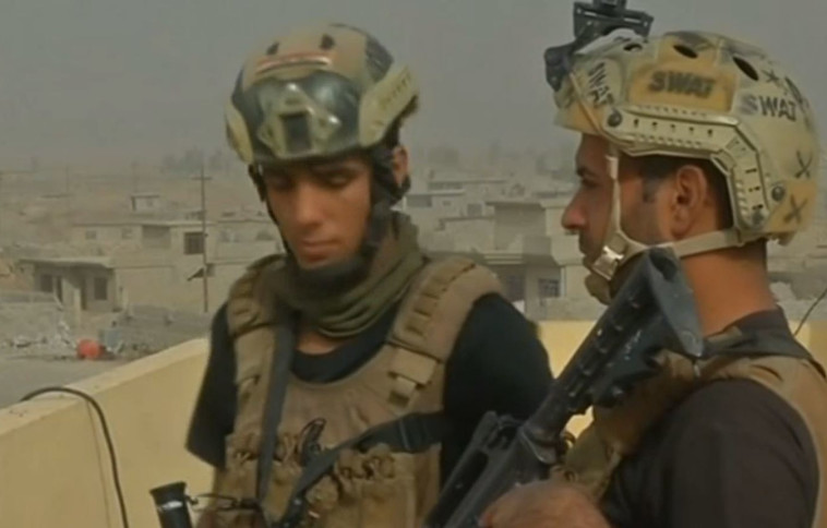 כוחות עיראקיים בתוך מוסול. לפחות 30 חיילים נהרגו. צילום: רויטרס