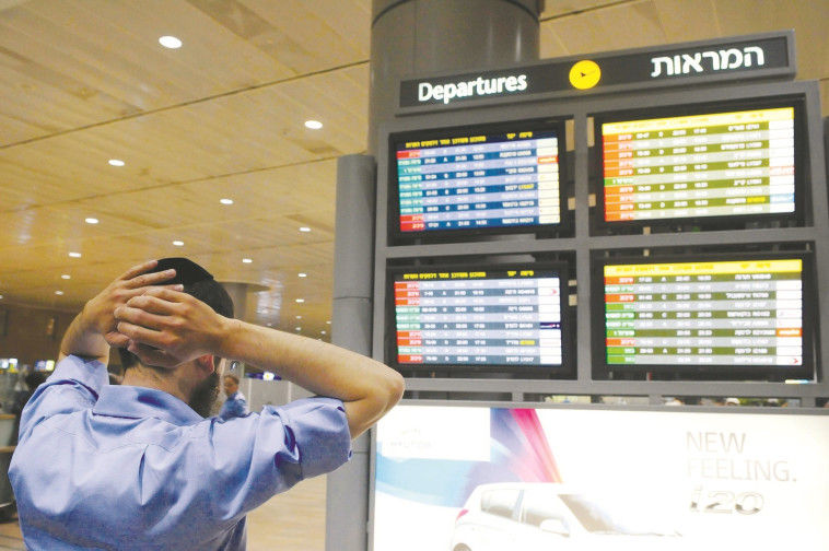 "מעולם לא היינו בעיצומים". לוח ההמראות בנתב"ג. צילום: יוסי זליגר, פלאש 90 "מעולם לא היינו בעיצומים". לוח ההמראות בנתב"ג. צילום: יוסי זליגר, פלאש 90
