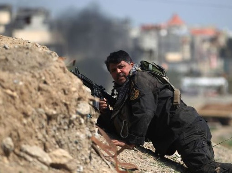 Getti Images :לוחם בצבא עיראק. בדרך להביס את דעא&quot;ש? צילום