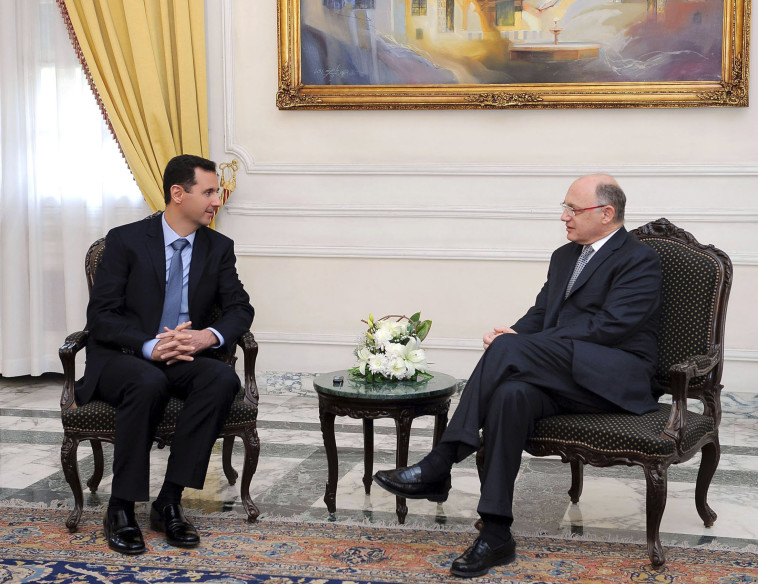 הפגישה בין אסד לטימרמן. צילום: רויטרס