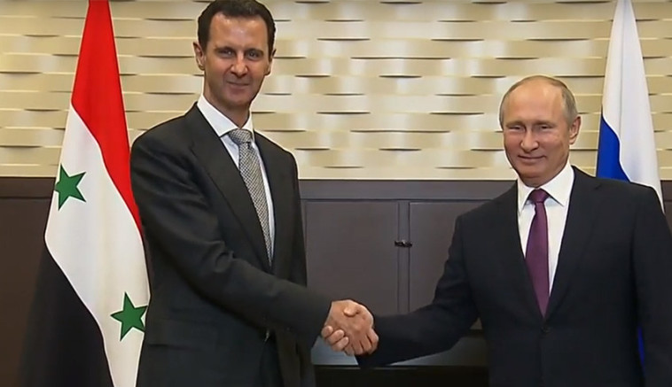 ולדימיר פוטין ובשאר אסד. צילום מסך