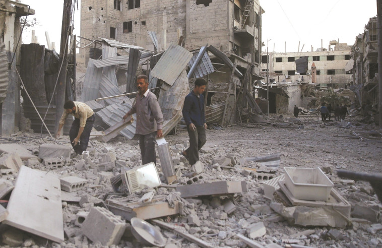הריסות בחלב. 200 עד 350 מיליארד דולר לשיקום סוריה. צילום: רויטרס