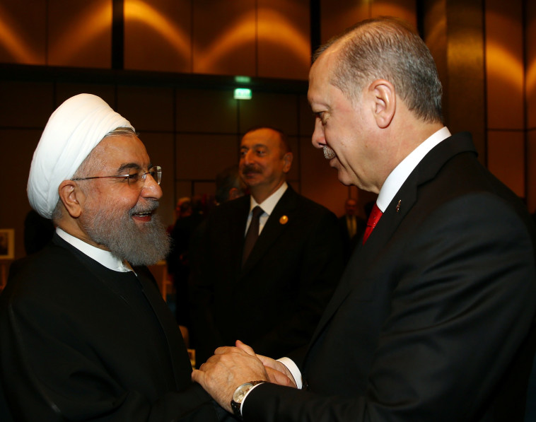 ארדואן עם רוחאני. &quot;האיראנים לא תקפו&quot;. צילום: רויטרס