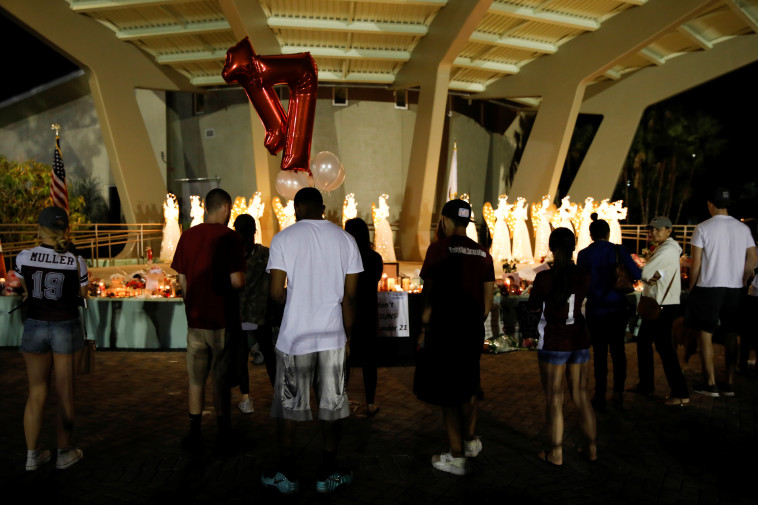 פינת הנצחה לזכר הנרצחים. צילום: רויטרס