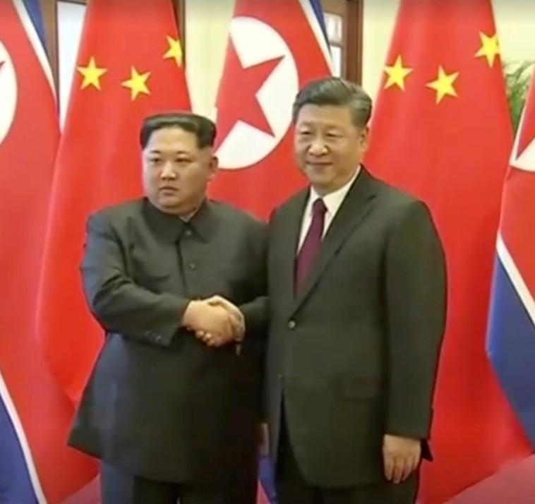 שי ג'ינפינג וקים ג'ונג און. צילום: רויטרס