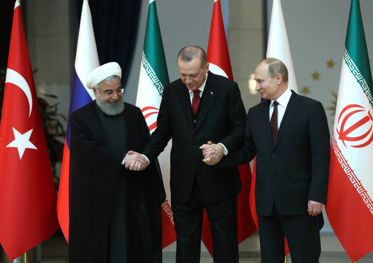 רוחאני עם פוטין וארדואן. צילום: AFP