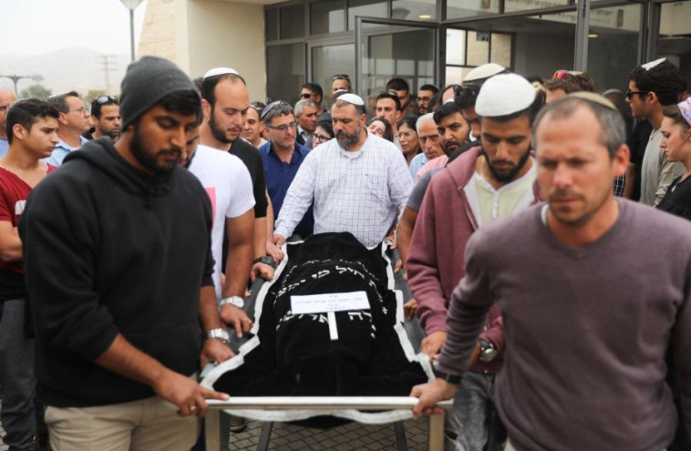 אלה אור מובאת למנוחות. צילום: יונתן זינדל, פלאש 90