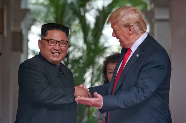 פגישת קים וטראמפ. צילום: AFP פגישת קים וטראמפ. צילום: AFP