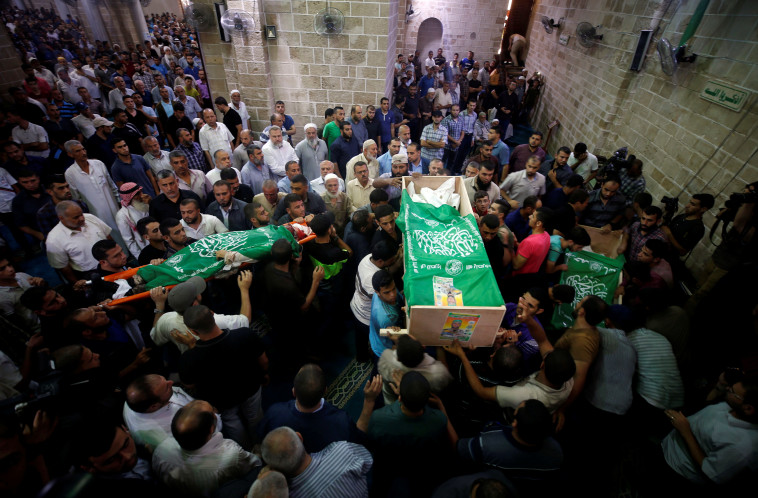 הלוויה של פעילי חמאס שנהרגו מאש צה&quot;ל. צילום: רויטרס