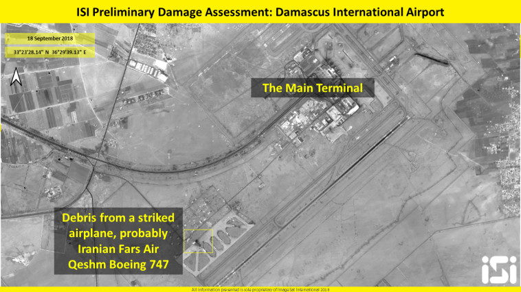 שברי מטוס איראני שהותקף בנמל התעופה של דמשק. צילום: http://www.imagesatintl.com 