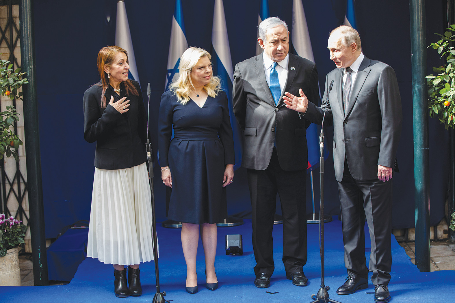 יפה יששכר, ראש הממשלה, רעייתו ונשיא רוסיה פוטין. צילום: רויטרס