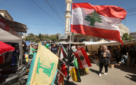 דגלי לבנון וחיזבאללה (צילום: רויטרס)