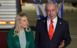 בנימין נתניהו, שרה נתניהו, לפני ההמראה לאו"ם (צילום: עומר מירון /לע"מ)