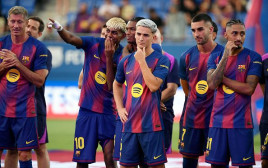 שחקני ברצלונה (צילום: JOSEP LAGO)