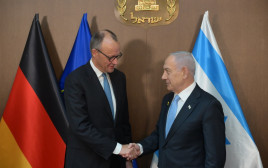 בנימין נתניהו ופרידריך מרץ (צילום: עמוס בן גרשום/לע״מ)