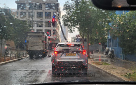 גשם בתל אביב באוגוסט (צילום: בר בולנדי)