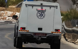 ניידת משטרה (צילום: פלאש 90)