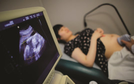 אישה בהריון (צילום: רויטרס)