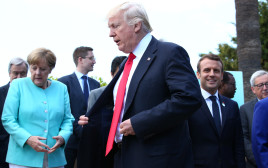 דונלד טראמפ ואנגלה מרקל בפסגת ה-G7 (צילום: רויטרס)