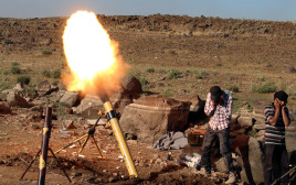מורדים בסוריה (צילום: רויטרס)