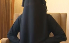אישה של פעיל דאעש (צילום: youtube)