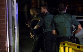 חשוד בתכנון הפיגוע בברצלונה מובא למעצרו (צילום: רויטרס)