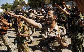 לוחמים חות'ים (צילום: AFP)