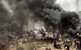 עימותים בגבול רצועת עזה (צילום: AFP)