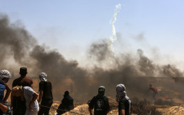 מהומות בגבול רצועת עזה (צילום: עבד רחים כתיב, פלאש 90)
