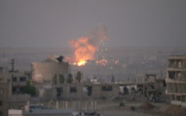 הפצצות בדרעא (צילום: AFP)