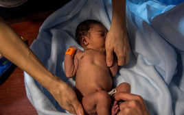 תינוק (צילום: OLMO CALVO/Getty images)