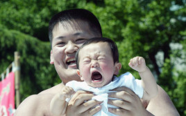 תינוק בוכה  (צילום: Koichi Kamoshida/Getty images)