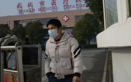 וירוס בסין (צילום: Noel Celis / AFP)