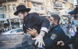 עימות בין המשטרה לחרדים במאה שערים (צילום: יונתן זינדל, פלאש 90)