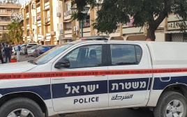 ניידת משטרה בזירת הרצח