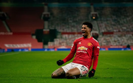 מרכוס ראשפורד חוגג (צילום: Ash Donelon/Manchester United via Getty Images)