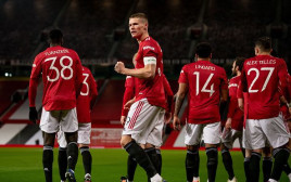 סקוט מקטומיניי חוגג (צילום: Ash Donelon/Manchester United via Getty Images)