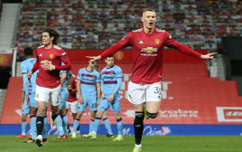 סקוט מקטומיניי חוגג (צילום: Matthew Peters/Manchester United via Getty Images)