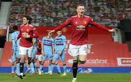 סקוט מקטומיניי חוגג (צילום: Matthew Peters/Manchester United via Getty Images)