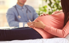 אישה בהריון (צילום: Shutterstock)