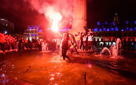 אוהדי ליל חוגגים אליפות (צילום: FRANCOIS LO PRESTI/AFP via Getty Images)