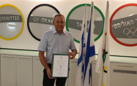 יו"ר הוועד האולימפי בישראל יגאל כרמי (צילום: אתר רשמי, באדיבות הוועד האולימפי בישראל)